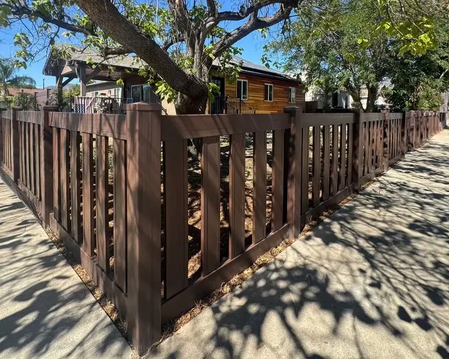 a 6 foot dark sequoia vinyl fence automatic gate in san fernando ca