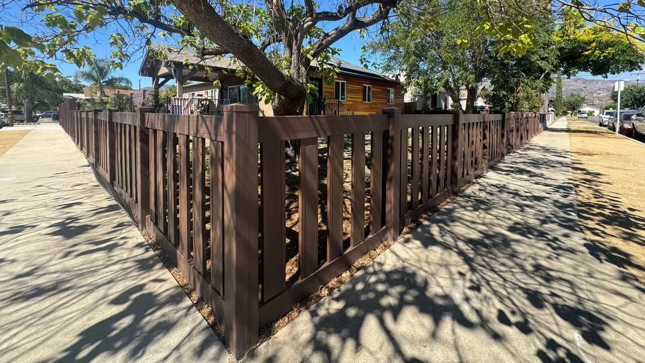 a 6 foot dark sequoia vinyl fence automatic gate in san fernando ca