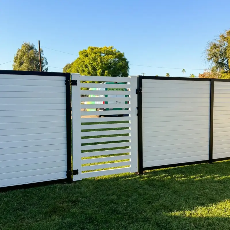 White Horizontal Slat Fence And Gate Combination With Black Metal Frames