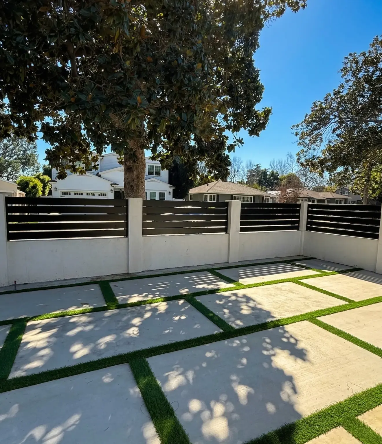 Black Aluminum Wall Topper Installation in Sherman Oaks